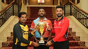 Photo: X | Kausthub Gudipati : Hong Kong, Kuwait and Malaysia captains with the Malaysia T20I Tri-Nations Cup 2024 trophy.